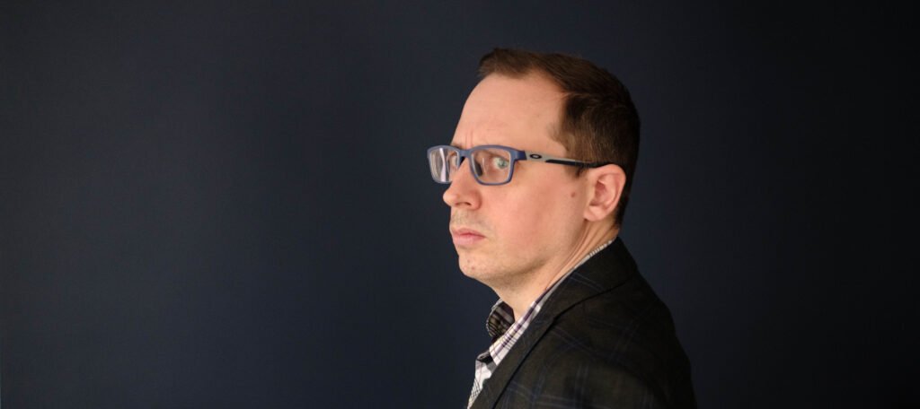 A photo of Nick Hodder looking at you like you made him angry.  What did you do?